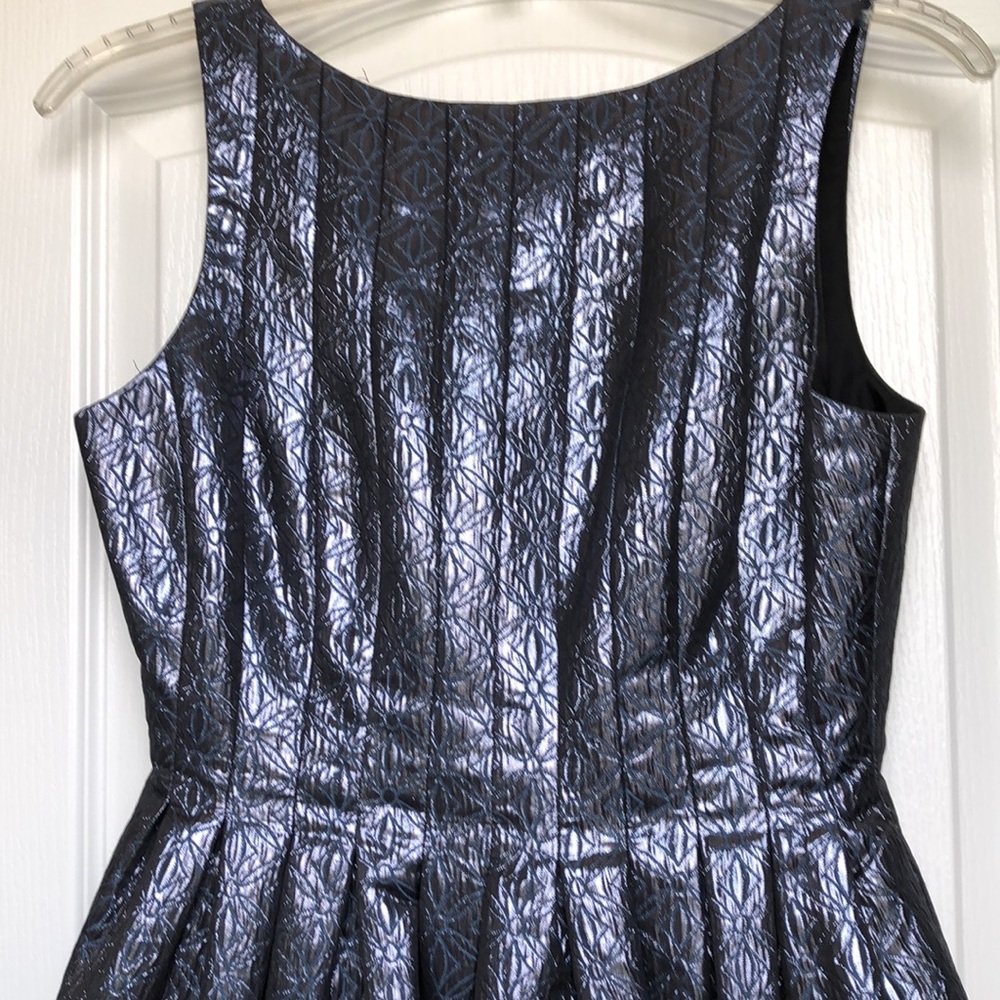Maggy London blue dress iridescent fabric. Midi length. Balloon hem. size 4.